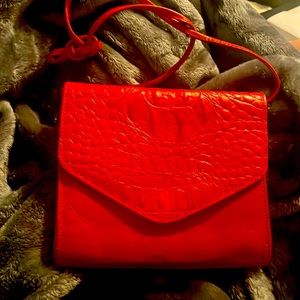 A Portofino red leather bag Used in excellent cond. inside spotless 61/2 X 71/2